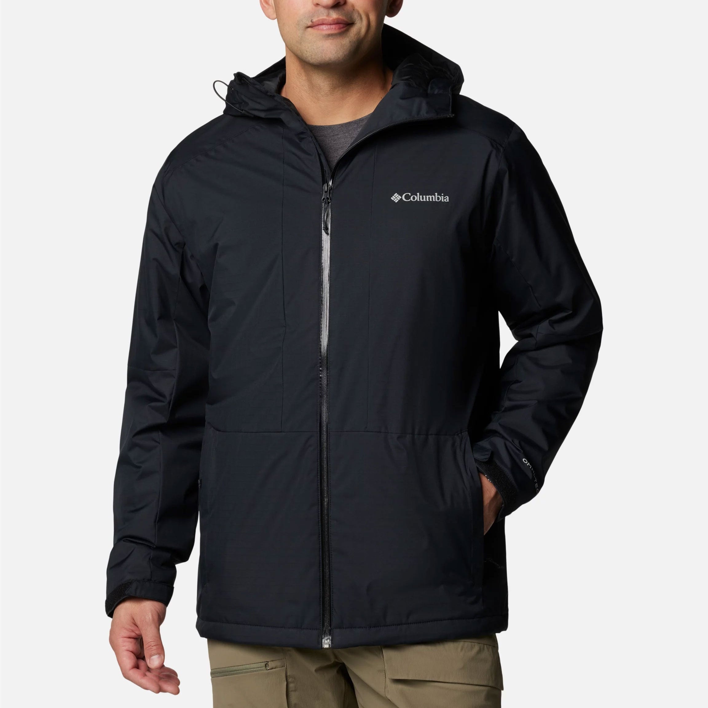 Man wearing a black Columbia jacket on a white background